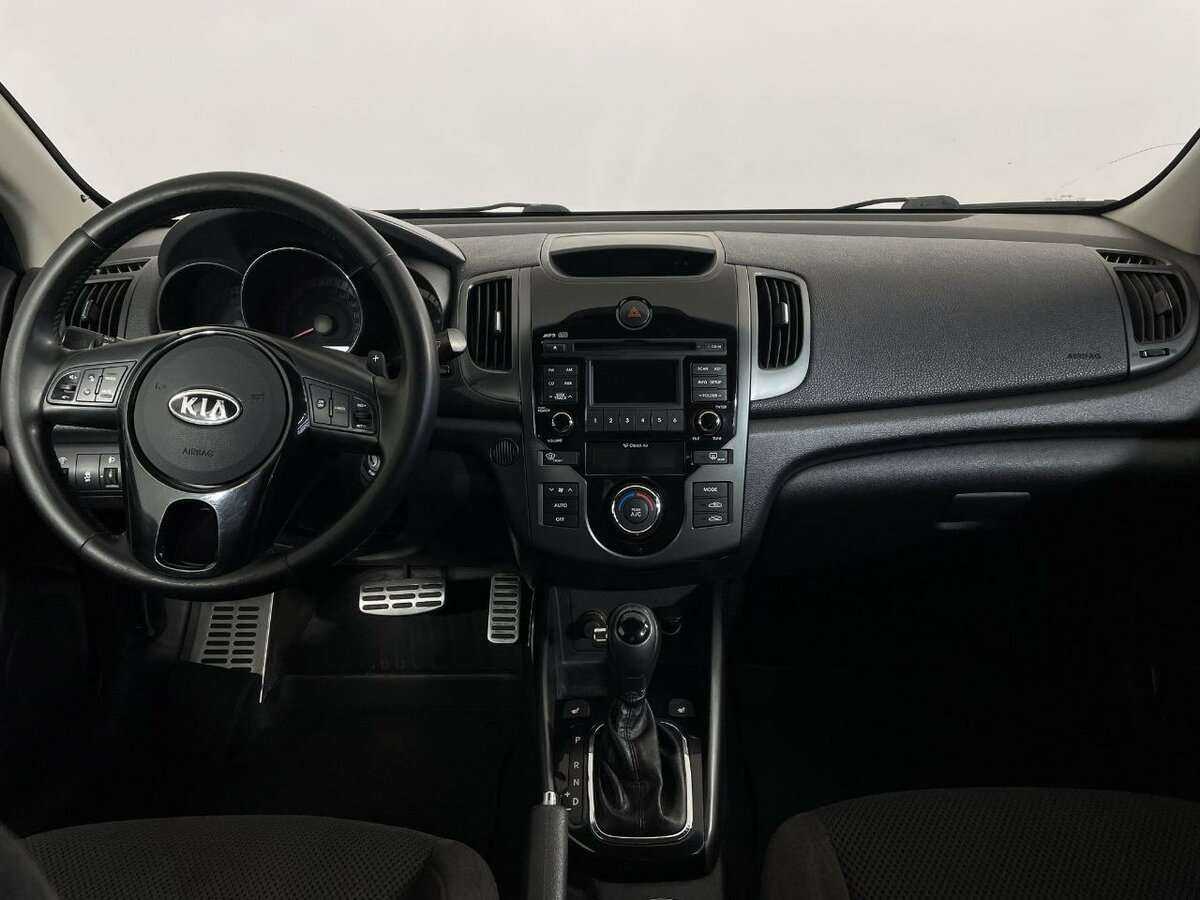 Kia Cerato 2012 года с пробегом. Фото: #5