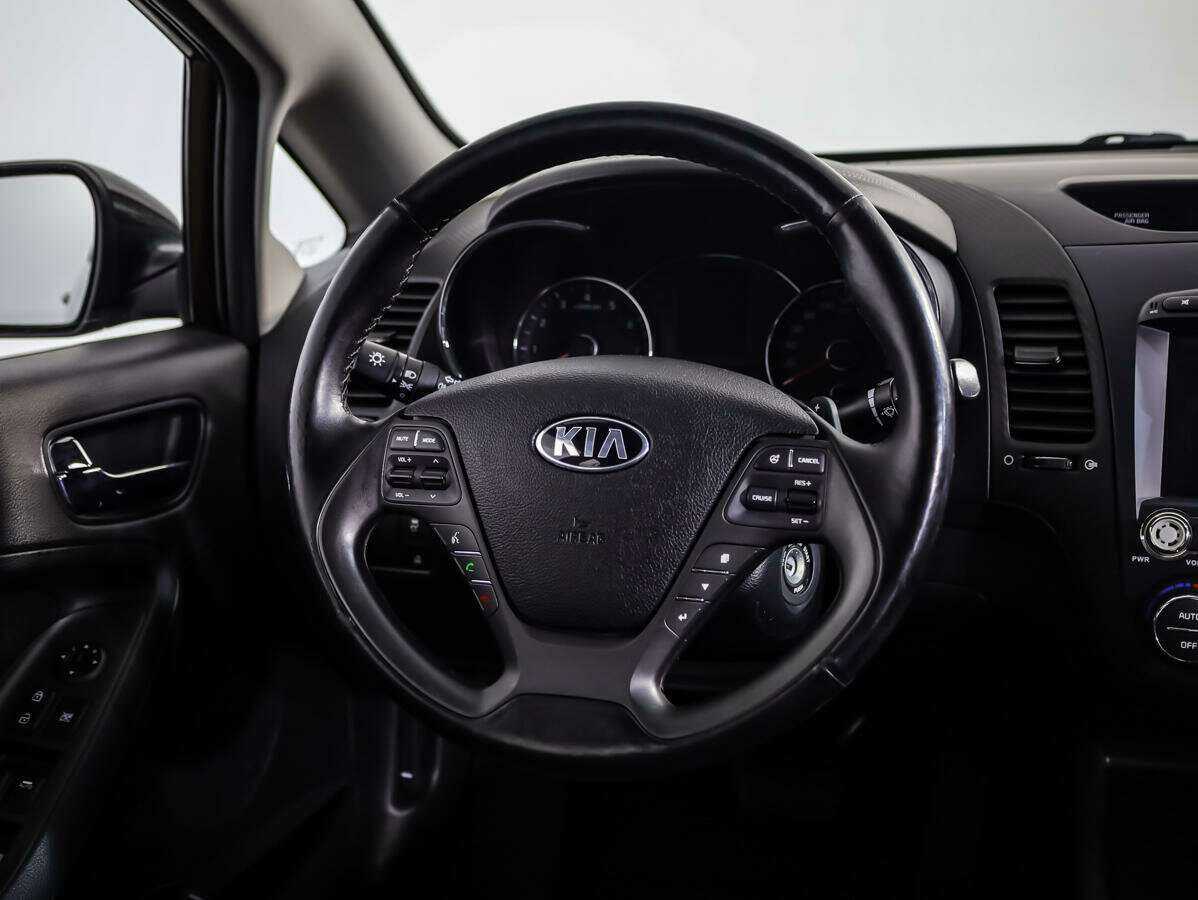 Kia Cerato 2015 года с пробегом. Фото: #9