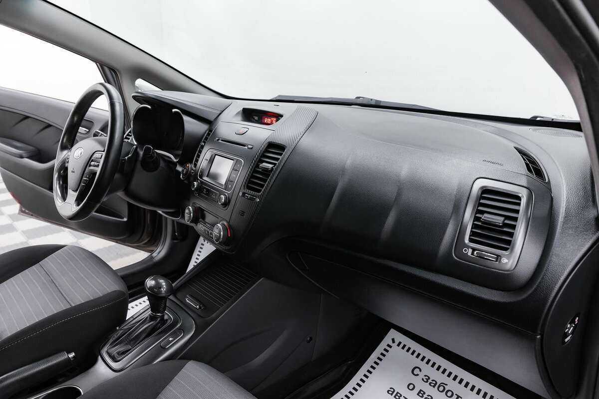 Kia Cerato 2013 года с пробегом. Фото: #14