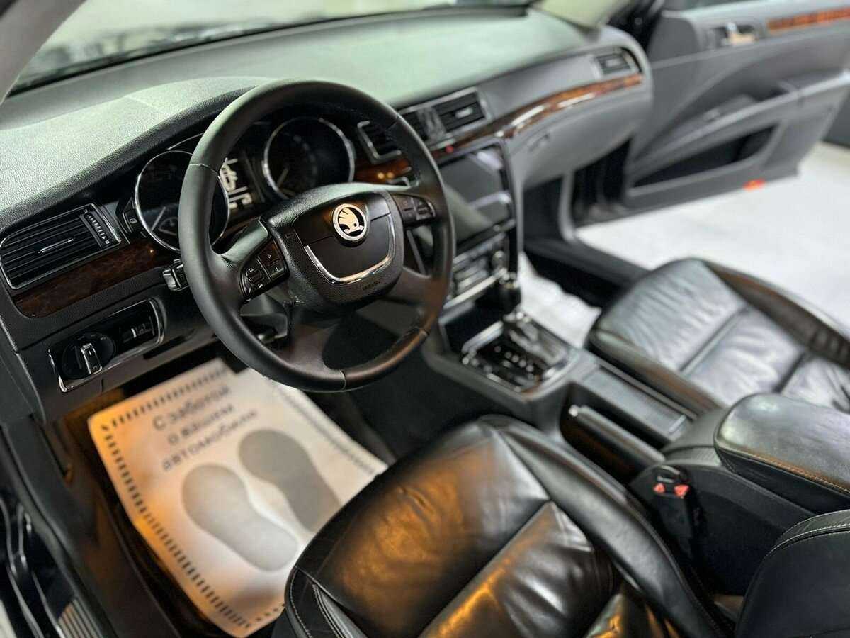 Skoda Superb 2013 года с пробегом. Фото: #8