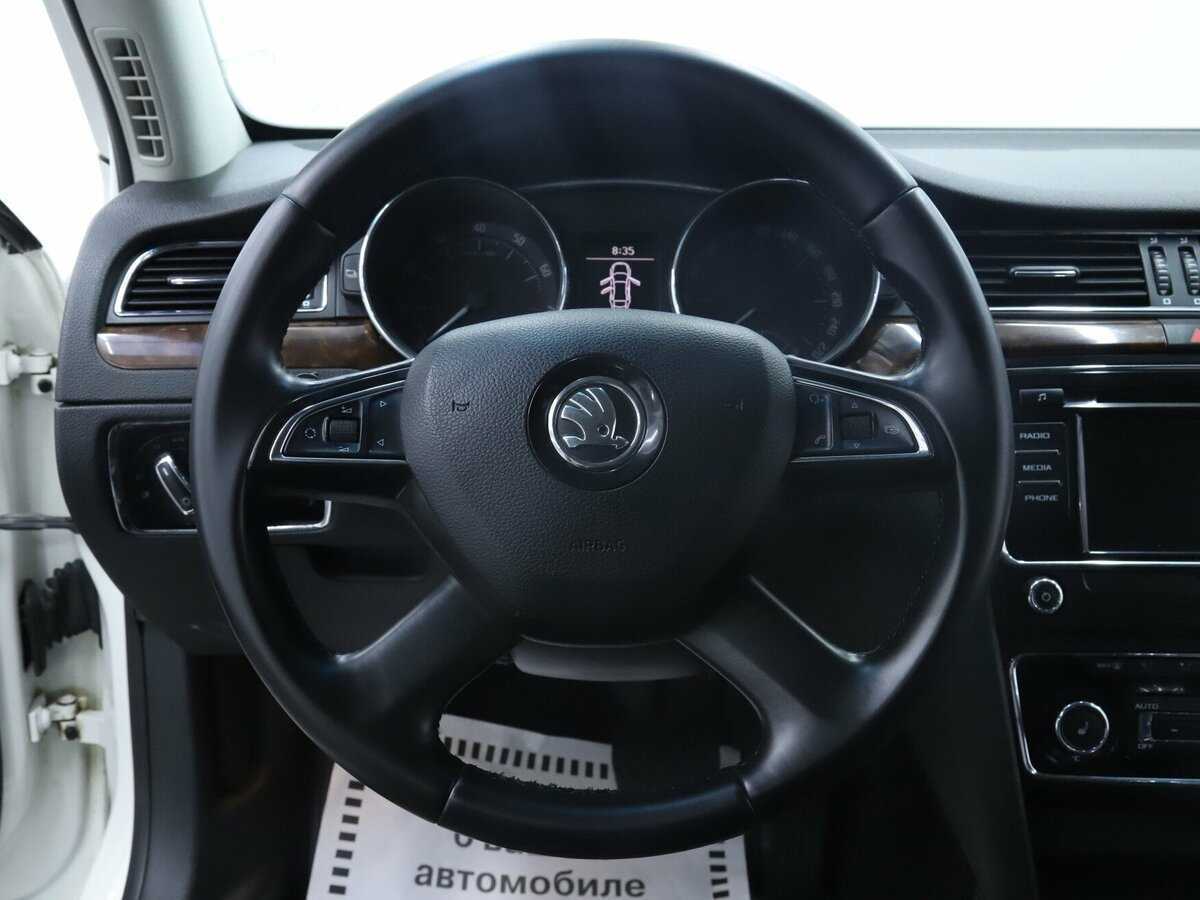 Skoda Superb 2013 года с пробегом. Фото: #10