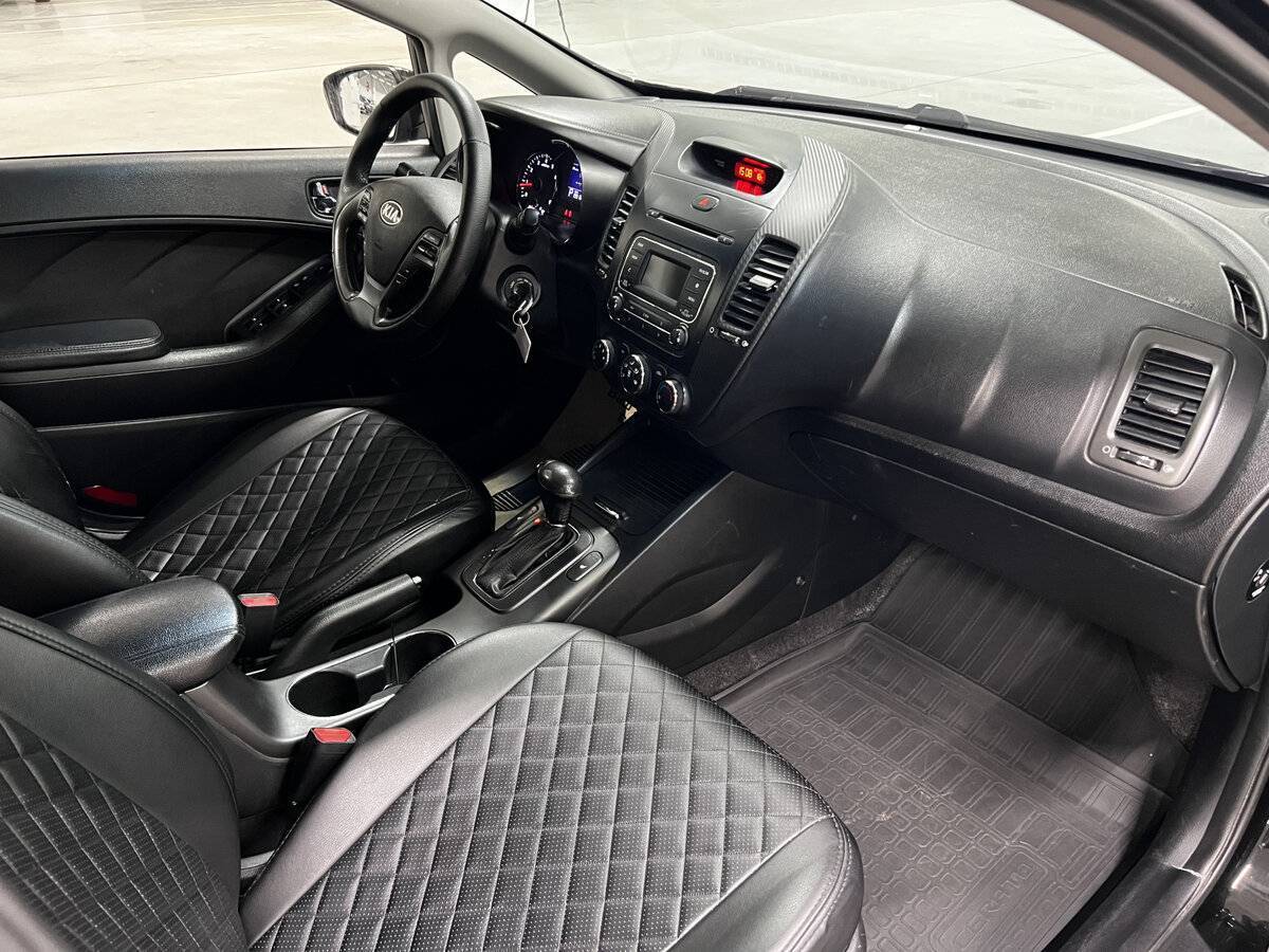 Kia Cerato 2014 года с пробегом. Фото: #10