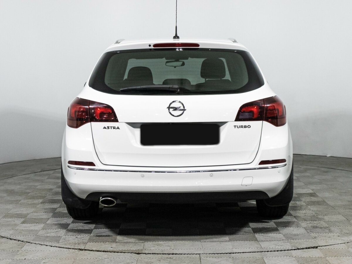 Б/У Опель Астра 2014 года. Фото: #5